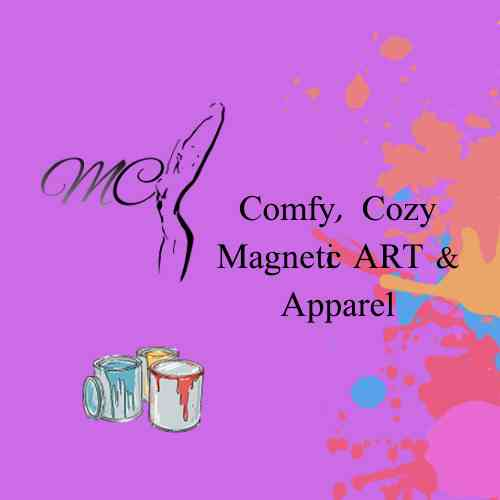 The MC logo with a black silhouette of a womans body. text reads " Comfy, Cozy Magnetic Art & Apparel. Purple background with orange, yellow, blue, and red paint splatter in the right bottom corner. Bottom left corner shows three paint cans